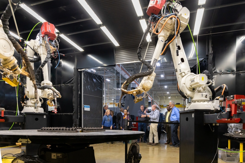A robotic arm performing automated work on a production line